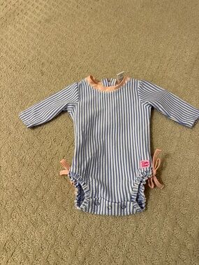 Ruffle Butts Blue & White Striped One-Piece with Pink Trim